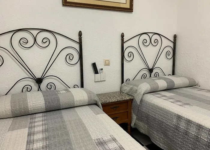 El Emigrante Dos Hermanas